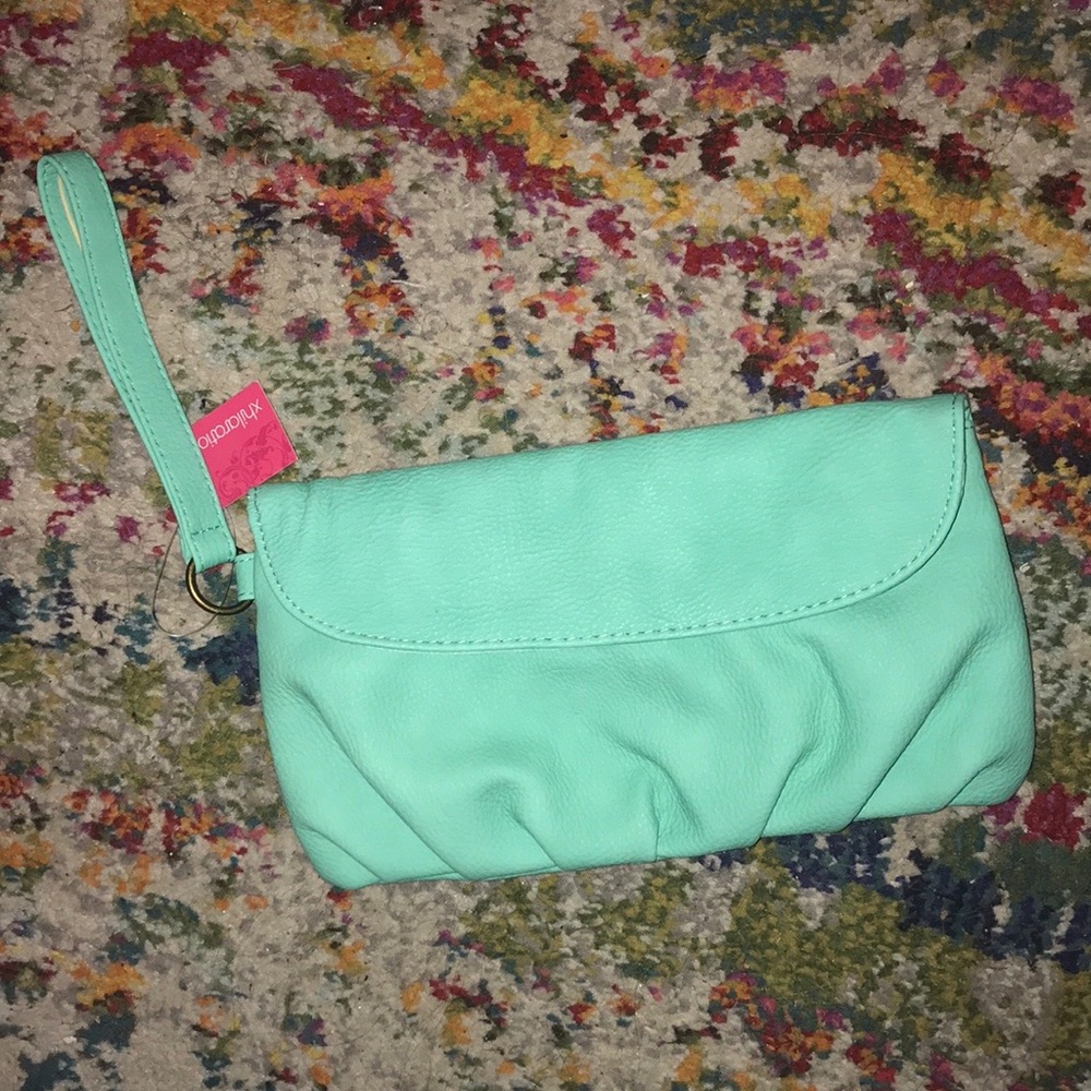 NWT Wrislet with Strap